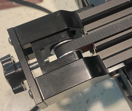 Aluminum x-belt tensioner